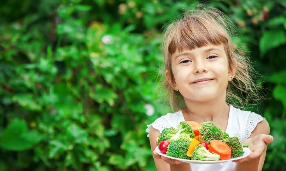 Girl with vegetable dish