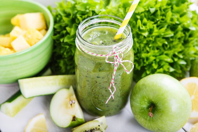 Hearty lunch detox smoothie with banana, apple, spinach, nuts and flax seeds